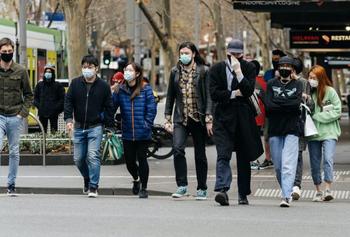 People walking down the street.