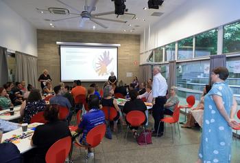 Image of attendees of FNQ Life Promotion and Suicide Prevention Collaborative event looking at screen